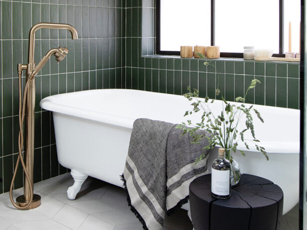 Stunning, green-tiled bathroom in Vancouver’s Douglas Park neighbourhood