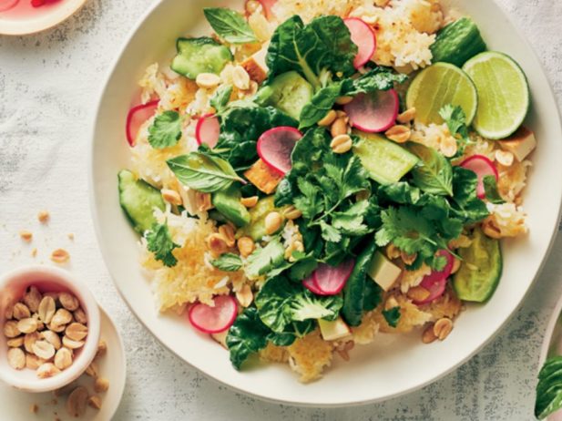 a colourful rice salad topped with cilantro