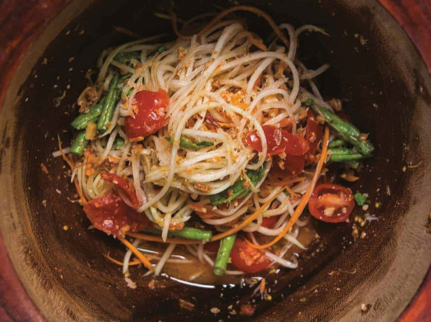 green papaya salad freshly made in a bowl